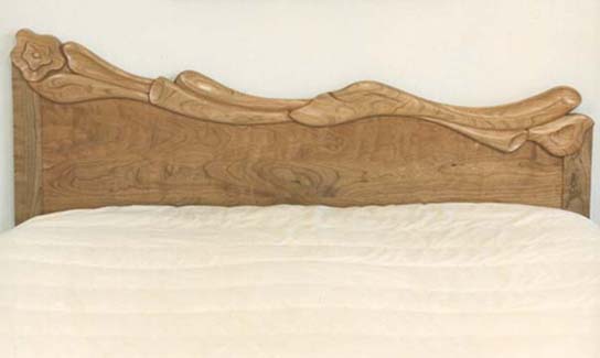 carved cherry headboard