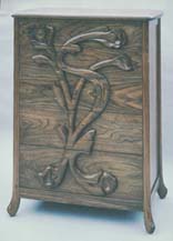 carved walnut chest of drawers