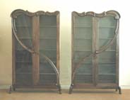 carved walnut bookcases