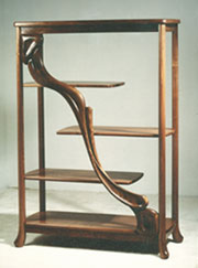 Carved walnut etagere